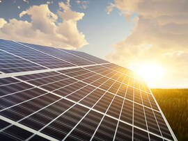 panoramic - solar panel at sunset